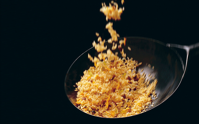 Image of tossed rice during frying